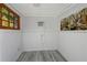 Bright small room with white walls and wood floors at 418 Sarabay Rd, Osprey, FL 34229