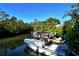 Enjoy serene waterfront views with private boat slips available at 418 Sarabay Rd, Osprey, FL 34229