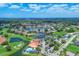 Community overview featuring clubhouse, pool, and golf course at 4202 Caddie E Dr # 102, Bradenton, FL 34203