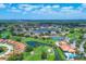 Community overview featuring clubhouse, pool, and golf course at 4202 Caddie E Dr # 102, Bradenton, FL 34203