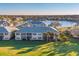 Aerial view showcasing condo building's rear, overlooking the golf course at 4202 Caddie E Dr # 102, Bradenton, FL 34203