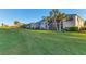 Ground level view of condo building near golf course at 4202 Caddie E Dr # 102, Bradenton, FL 34203