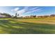 Landscaped golf course with homes in the background at 4202 Caddie E Dr # 102, Bradenton, FL 34203