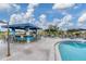 Refreshing pool with adjacent outdoor bar and seating at 4202 Caddie E Dr # 102, Bradenton, FL 34203