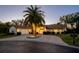 Beautiful home exterior at dusk at 4512 Spring Flower Ct, Sarasota, FL 34233