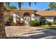 Front entrance of the house with double doors and lush landscaping at 4512 Spring Flower Ct, Sarasota, FL 34233