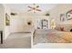 Spacious main bedroom with carpeting and ceiling fan at 4512 Spring Flower Ct, Sarasota, FL 34233