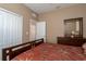 Bedroom with double closet and a ceiling fan at 4608 Halls Mill Xing, Ellenton, FL 34222