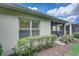 House exterior showcasing a window with plantation shutters at 4826 Maymont Park Cir, Bradenton, FL 34203