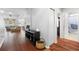 View down a hallway showing the living room and bathroom at 5007 Elmhurst Ln, Palmetto, FL 34221