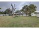 Spacious backyard with a large tree at 5117 6Th Avenue W Dr, Bradenton, FL 34209