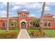 Attractive community entrance with landscaping and walkway at 5133 Cantabria Crst, Sarasota, FL 34238