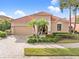 Attractive single-story home with a tile roof and landscaped front yard at 5133 Cantabria Crst, Sarasota, FL 34238