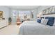 Bright main bedroom with bay window and sitting area at 5133 Cantabria Crst, Sarasota, FL 34238