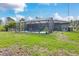 Large backyard with fenced pool and area for grilling at 5375 Joslyn Ter, Port Charlotte, FL 33981