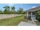 Backyard view of home and fenced area at 5687 Milton Ave, Sarasota, FL 34243