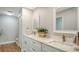 Elegant bathroom with double vanity and quartz countertop at 5687 Milton Ave, Sarasota, FL 34243