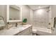 Clean bathroom with white vanity and marble shower at 5687 Milton Ave, Sarasota, FL 34243