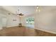 Bright dining room with hardwood floors and sliding glass doors at 5687 Milton Ave, Sarasota, FL 34243