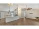 Modern kitchen with white cabinets and a large island at 5687 Milton Ave, Sarasota, FL 34243