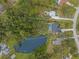 House with pool and large lot, backing up to a lake at 6207 93Rd Street E Cir, Bradenton, FL 34202