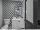 Stylish bathroom with patterned tile and modern vanity at 6207 93Rd Street E Cir, Bradenton, FL 34202