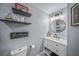 Clean and modern bathroom with floating vanity at 6207 93Rd Street E Cir, Bradenton, FL 34202