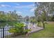 Relaxing dock overlooking a serene lake, perfect for enjoying the view at 6207 93Rd Street E Cir, Bradenton, FL 34202