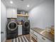 Laundry room with washer, dryer and ample counter space at 6207 93Rd Street E Cir, Bradenton, FL 34202