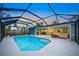 Inviting pool area with covered patio and seating at 6207 93Rd Street E Cir, Bradenton, FL 34202