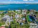 Prime waterfront lot with neighboring tennis court at 624 Norsota Way, Sarasota, FL 34242