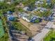 Aerial view showing a large lot with a main house and a guesthouse at 624 Norsota Way, Sarasota, FL 34242