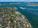 Aerial view of waterfront property with a large lot and surrounding homes at 624 Norsota Way, Sarasota, FL 34242