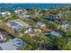 Aerial view of property showing main house, guesthouse, and waterfront access at 624 Norsota Way, Sarasota, FL 34242