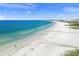 Expansive Siesta Key Beach with white sand and turquoise water at 624 Norsota Way, Sarasota, FL 34242