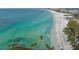 White sand beach and clear water aerial view at 624 Norsota Way, Sarasota, FL 34242