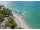 Aerial of pristine beach and turquoise water at 624 Norsota Way, Sarasota, FL 34242