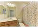 Bathroom with shower/tub combo and seashell decor at 6512 Willowshire Way, Bradenton, FL 34212