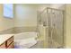 Bathroom with shower and garden tub at 6512 Willowshire Way, Bradenton, FL 34212