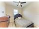 Charming bedroom with ceiling fan and wood-look floors at 6512 Willowshire Way, Bradenton, FL 34212