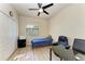 Bedroom with home office and ceiling fan at 6512 Willowshire Way, Bradenton, FL 34212