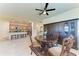 Open concept dining area adjacent to kitchen and living room at 6512 Willowshire Way, Bradenton, FL 34212