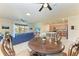 Open concept dining area with kitchen and living room views at 6512 Willowshire Way, Bradenton, FL 34212