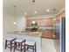 Modern kitchen with granite countertops and stainless steel appliances at 6512 Willowshire Way, Bradenton, FL 34212