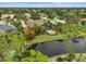 Aerial view of home and surrounding neighborhood at 654 Trenton Way, Osprey, FL 34229