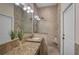 Bathroom with granite countertops and a walk-in shower at 654 Trenton Way, Osprey, FL 34229