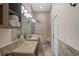 Elegant bathroom with granite countertops and a spacious shower at 654 Trenton Way, Osprey, FL 34229