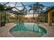 Resort-style pool with covered patio and spa at 654 Trenton Way, Osprey, FL 34229