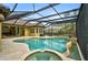 Stunning pool and spa with covered patio and lounge area at 654 Trenton Way, Osprey, FL 34229