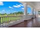 Veranda overlooking the golf course with brick flooring at 654 Trenton Way, Osprey, FL 34229